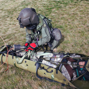 Remote Medical Training Supports Multiple Industries in learning how to provide care in Remote, Wilderness & Austere environments. Here a Student is learning how to hoist a patient in a SKED litter.