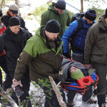 Load image into Gallery viewer, Learn how to safely move patients over adverse terrain in a Remote Medical Training Wilderness First Responder (WFR) course.